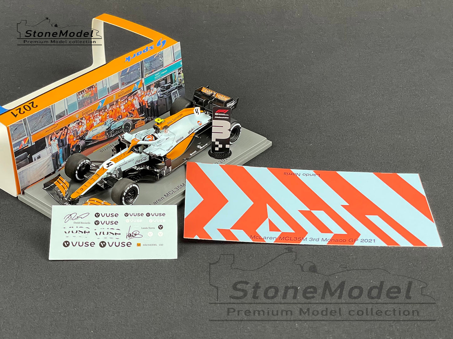 Mclaren F1 MCL35M 4 Lando Norris Monaco 2021 Spark 1:43 + Decal & Background Card